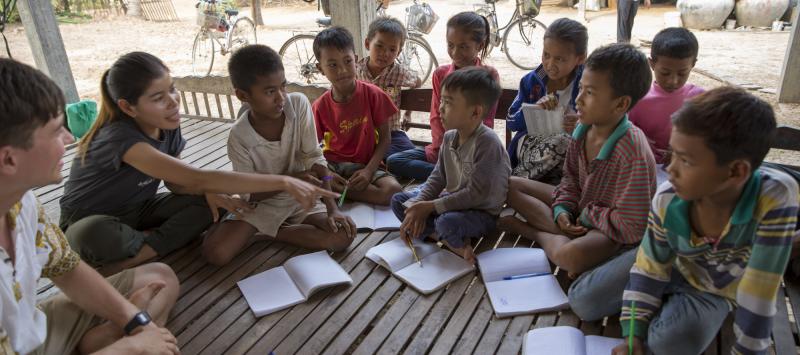 VSO ICS volunteers run a weekly English class for all children in the village at their host home